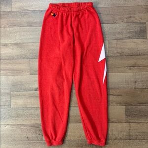 Aviator Nation Red Track Joggers with White Lightning Accent